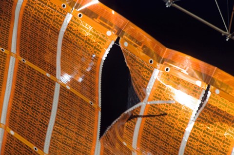 Framed Close-up of a Tear in Solar Array Material on the International Space Station Print