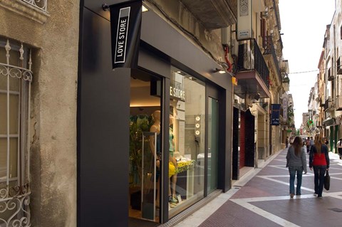 Framed Shopping street in Village of Vilanova i la Geltru, Catalonia, Spain Print