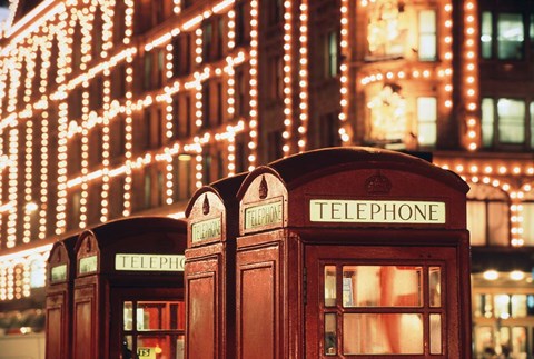 Framed Lit Telephone booth at Harrods, Knightsbridge, London, England Print