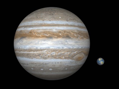 Framed Artist's concept Comparing the Size of the Gas Giant Jupiter with That of the Earth Print