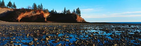 Framed Sea Caves on Rocky Beach Print