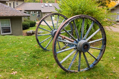 Framed Wagon wheels at Oliver Lodge on Lake Winnipesauke, Meredith, New Hampshire Print
