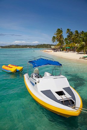 Framed Powerboat and banana boat, Plantation Island Resort, Malolo Lailai Island, Mamanuca Islands, Fiji Print