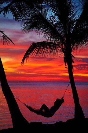 Framed Woman in hammock, and palm trees at sunset, Fiji Print