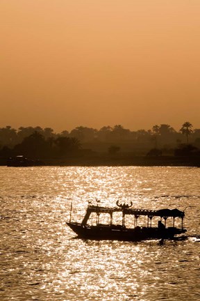 Framed Egypt, Luxor Water taxi at sunset Nile River Print