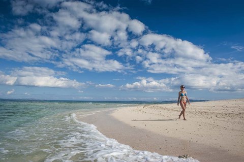 Framed Woman walking on white sand beach of Beachcomber Island, Mamanucas Islands, Fiji Print