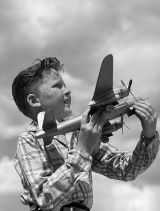 Framed 1930s 1940s 1950s  Freckle-Faced Boy Holding Airplane Print