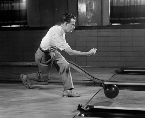 Framed 1950s Side View Of Man Bowling Print