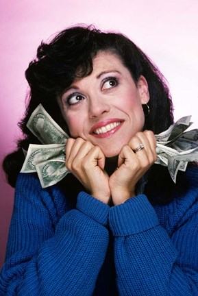 Framed Excited Brunette Woman Holding Several Dollar Bills Print