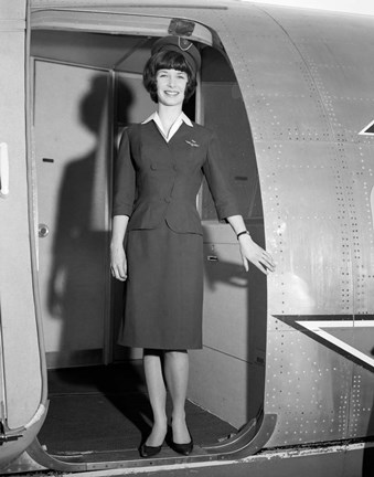 Framed 1960s Smiling Stewardess Standing In Doorway Print