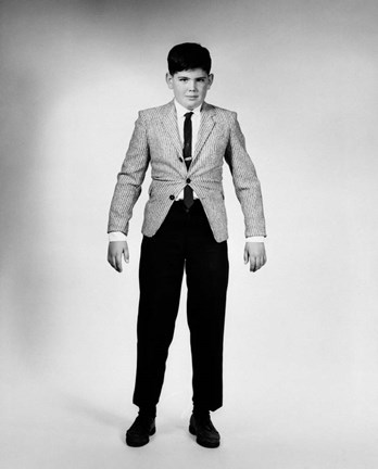 Framed 1950s 1960s Overgrown Boy Looking At Camera Print