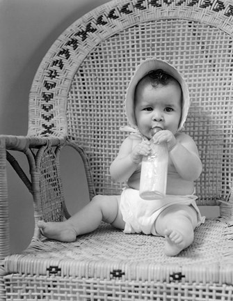 Framed 1940s Baby Sitting In Wicker Chair Print