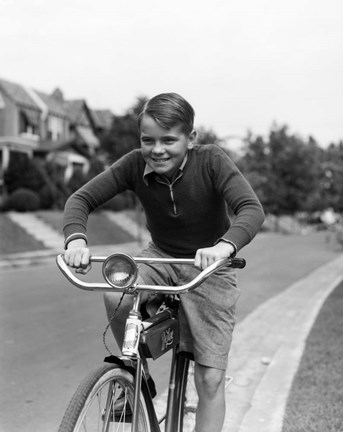 Framed 1930s Smiling Boy Riding Bicycle Print