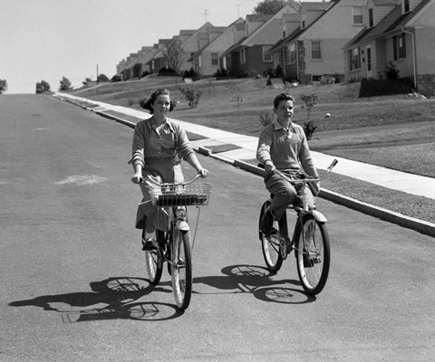 Framed 1950s Teen Boy Girl Couple Riding Bikes Print