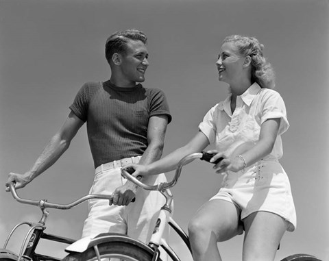 Framed 1930s 1940s Smiling Couple On Bikes Looking At One Another Print