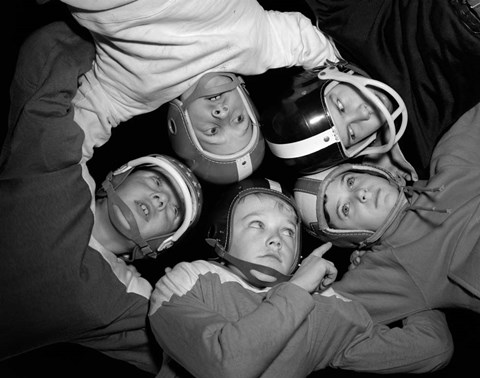 Framed 1960s Five Boys In Huddle Wearing Helmets &amp; Football Jerseys Print