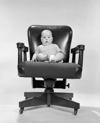 Framed 1960s Baby Sitting In Executive Office Chair Print