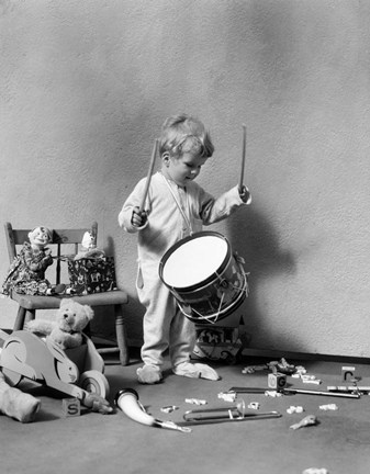 Framed 1930s Boy Beating On Toy Drum Print