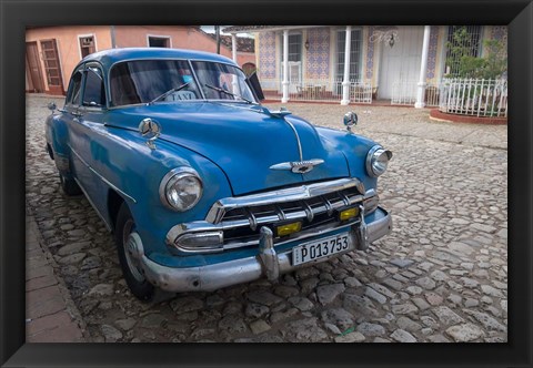 Framed Cuba, Trinidad Blue Taxi Parked On Cobblestones Print