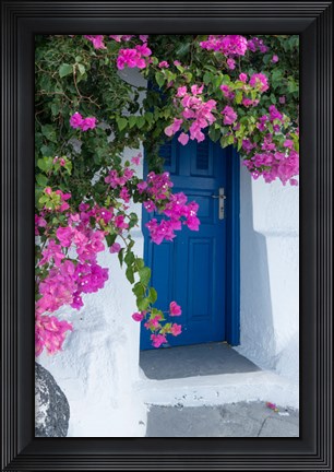 Framed Greece, Santorini A Picturesque Blue Door Is Surrounded By Pink Bougainvillea In Firostefani Print