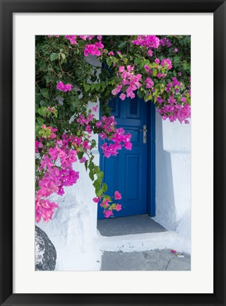 Framed Greece, Santorini A Picturesque Blue Door Is Surrounded By Pink Bougainvillea In Firostefani Print