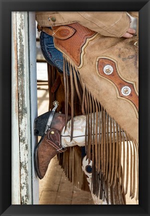 Framed Cowgirl Standing In Doorway Of Old Log Cabin Print