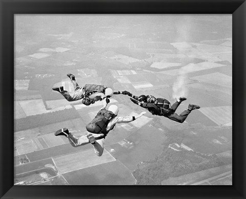 Framed Three Men Holding Hands Sky Diving Print