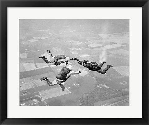 Framed Three Men Holding Hands Sky Diving Print