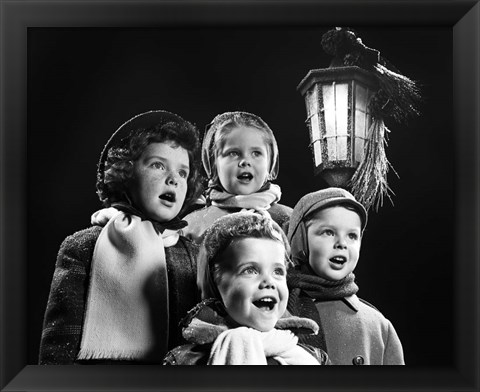 Framed Children Singing Christmas Carols Outdoor By Lantern Light Print
