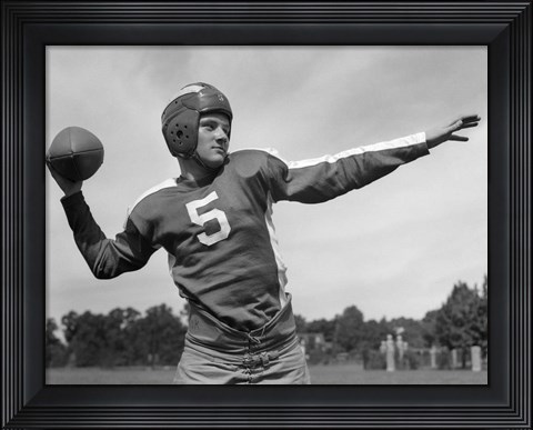 Framed Quarterback About To Toss Football Pass Print