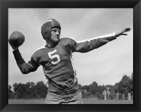 Framed Quarterback About To Toss Football Pass Print