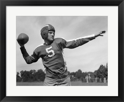 Framed Quarterback About To Toss Football Pass Print