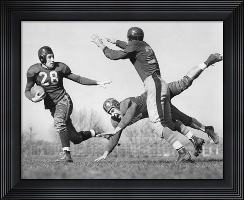 Framed Three Men Playing Football Print