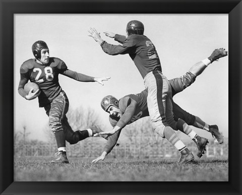 Framed Three Men Playing Football Print