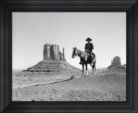 Framed Navajo Indian In Cowboy Hat On Horseback With Monument Valley Rock Formations In Background Print