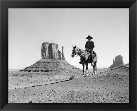 Framed Navajo Indian In Cowboy Hat On Horseback With Monument Valley Rock Formations In Background Print