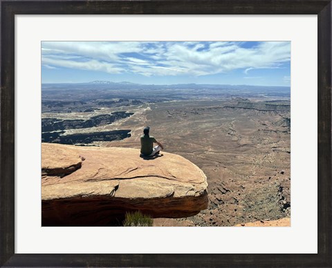 Framed Adult Male Sitting on the Edge Of a Stunning Viewpoint Print
