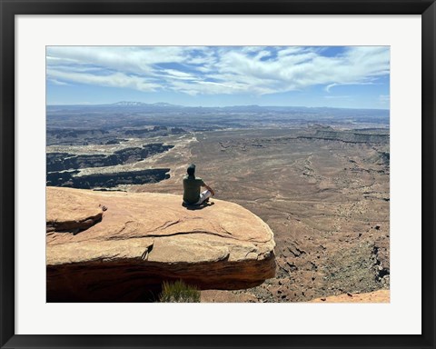 Framed Adult Male Sitting on the Edge Of a Stunning Viewpoint Print