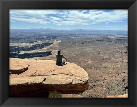 Framed Adult Male Sitting on the Edge Of a Stunning Viewpoint Print