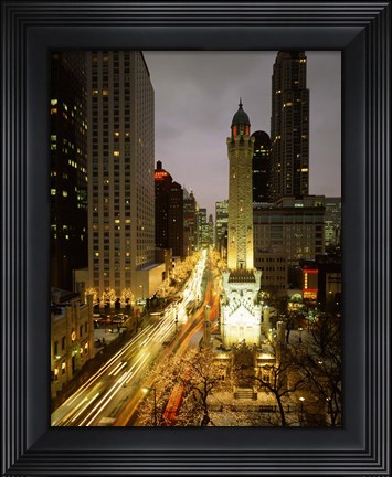 Framed Skyscrapers in a city lit up at night, Chicago, Illinois Print