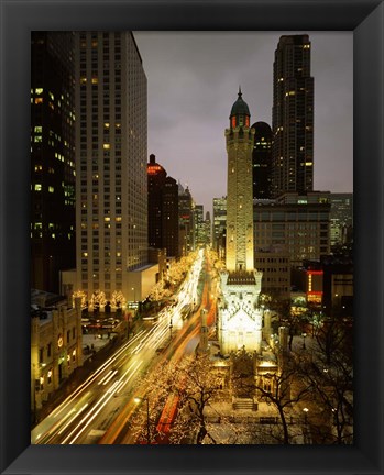 Framed Skyscrapers in a city lit up at night, Chicago, Illinois Print
