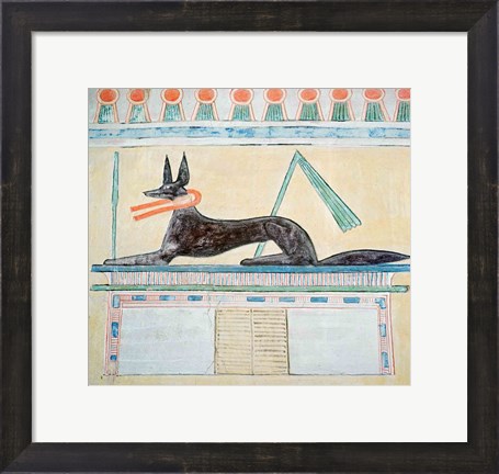 Framed Anubis, Egyptian god of the dead, lying on top of a sarcophagus Print