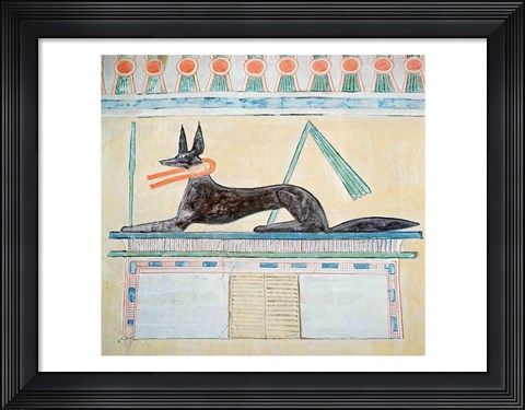 Framed Anubis, Egyptian god of the dead, lying on top of a sarcophagus Print
