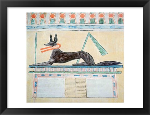 Framed Anubis, Egyptian god of the dead, lying on top of a sarcophagus Print