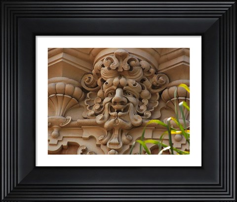 Framed Face In Stone On Buildings Wall Print