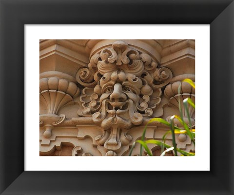 Framed Face In Stone On Buildings Wall Print