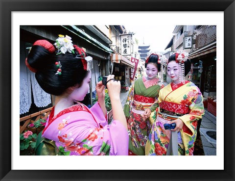 Framed Three geishas, Kyoto, Honshu, Japan (taking pictures) Print