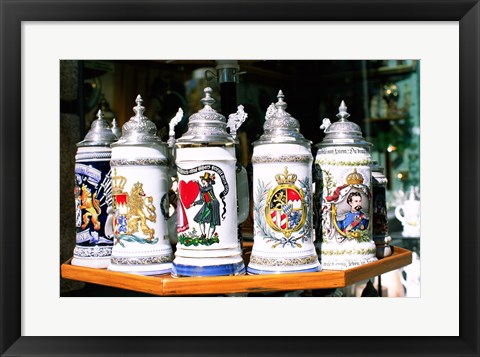 Framed Group of beer steins on a table, Munich, Germany Print