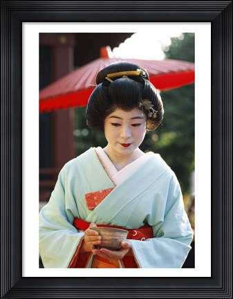 Framed Young woman dressed as a Geisha, Japan Print