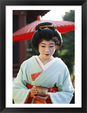 Framed Young woman dressed as a Geisha, Japan Print